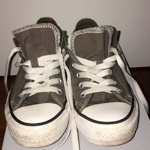 Grey and teal converse